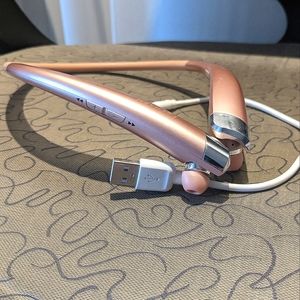Pink athletic Bluetooth headphones